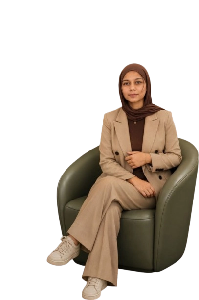 Professional woman in a formal suit sitting confidently in a modern chair